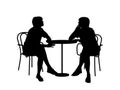 Two women sitting at the table Royalty Free Stock Photo
