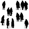 Silhouettes of walking old ladies isolated on white background. Royalty Free Stock Photo