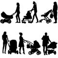 Silhouettes walkings mothers with baby strollers Royalty Free Stock Photo