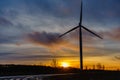 Silhouettes of wind turbines with a beautiful sunset Royalty Free Stock Photo