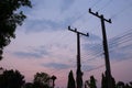 Silhouettes of wires and electric post