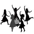 Silhouettes of witches dancing around the fire