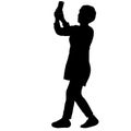 Silhouettes woman taking selfie with smartphone on white background Royalty Free Stock Photo