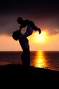 Silhouettes of women and a child Royalty Free Stock Photo