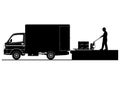 Silhouettes of worker loading small truck. Royalty Free Stock Photo