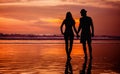 Silhouettes of young couple in love staing on the