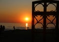 Silhouettes on the beach illuminated by the colors of the sunset Royalty Free Stock Photo