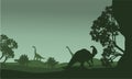 Silhouettte of parasaurolophus and stegosaurus Royalty Free Stock Photo