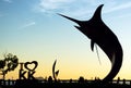 Kota Kinabalu, Malaysia - August 01, 2017: Silhouette of the famous Marlin fish statue at Sabah capital. The statue was