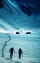 Silhoutte of people doing wintersport Royalty Free Stock Photo