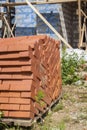 silicate bricks are stacked in pile on pallet and ready for construction
