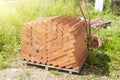 silicate bricks are stacked in pile on pallet and ready for construction