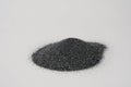 Silicon carbide abrasive powder for leveling stones isolated on white background. Silicon carbide for restore stones to Royalty Free Stock Photo