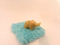 Silicon elephant on soft stand . Royalty Free Stock Photo