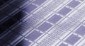 Closeup of a silicon wafer showcasing microchips and integrated circuits technology Royalty Free Stock Photo