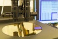 Silicon wafer on machine process examining in microscope Royalty Free Stock Photo