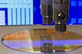 Silicon wafer with semiconductor microchip on machine process examining testing in microscope Royalty Free Stock Photo