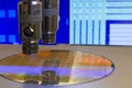 Silicon wafer with semiconductor microchip on machine process examining testing in microscope Royalty Free Stock Photo