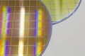 Silicon Wafers and Microcircuits - A wafer is a thin slice of semiconductor material, such as a crystalline silicon, used in Royalty Free Stock Photo