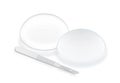 Silicone breast implants and scalpel blade. Royalty Free Stock Photo