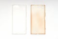 Silicone case on smartphone, damaged and brand new on white