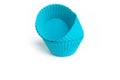 Silicone form for cooking cupcake on a white background