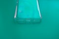 Silicone protective case for smartphone on turquoise blue background Royalty Free Stock Photo