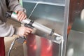 Silicone sealant gun operation Royalty Free Stock Photo