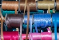 silk bias tape on spools for finishing edger\'s Royalty Free Stock Photo