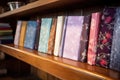 silk-bound sutras placed at the corner of a wooden shelves Royalty Free Stock Photo