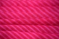 Pink silky cloth material background for fashion designers and dressers.