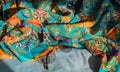 Silk clothes abstract texture and hippie sun glasses Royalty Free Stock Photo