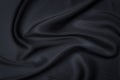 Silk or cotton fabric tissue. Dark gray or black color. Texture, background, pattern Royalty Free Stock Photo