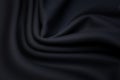 Silk or cotton fabric tissue. Dark gray or black color. Texture, background, pattern.. Royalty Free Stock Photo