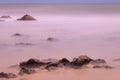 Smooth Silk Effect On Sea Rocks. Water Strokes That Produce A Blurry Effect On The Rocks