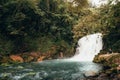 Silk effect water from waterfalls in a river in the middle of the jungle