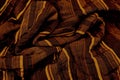 Silk Fabric Background, Abstract Flowing Waving Textile.brown with wide stripes fabric