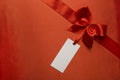 Silk Fabric Background, Red Satin Ribbon Bow, Price Tag Royalty Free Stock Photo