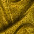 Silk fabric texture with geometric pattern. Many irregular folds. Abstract background best for luxury desing.