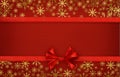 Silk ribbon and a bow on red paper Royalty Free Stock Photo