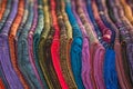 Silk shawls in different colors for sale. Royalty Free Stock Photo