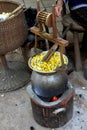 Boiling the silk thread. Royalty Free Stock Photo
