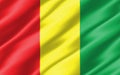 Silk wavy flag of Guinea graphic. Wavy Guinean flag 3D illustration. Rippled Guinea country flag is a symbol of freedom,