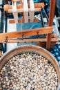 Silkworm cocoons in hot water in cauldron