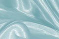 Silky fabric curve shape fashion white cloth abstract background with Beauty soft waves textured. luxury textile material blue c