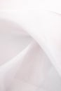 Silky fabric curve shape fashion white cloth abstract background with Beauty soft waves textured. luxury textile Milky Pink color. Royalty Free Stock Photo