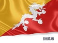 Silky flag of Bhutan waving on an isolated white background.
