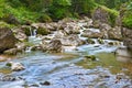 Silky mountain river, rocky scene Royalty Free Stock Photo