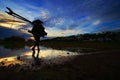 Sillhouette of fisherman at sunset