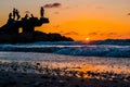 Sillhouette of people in the beach during sunset